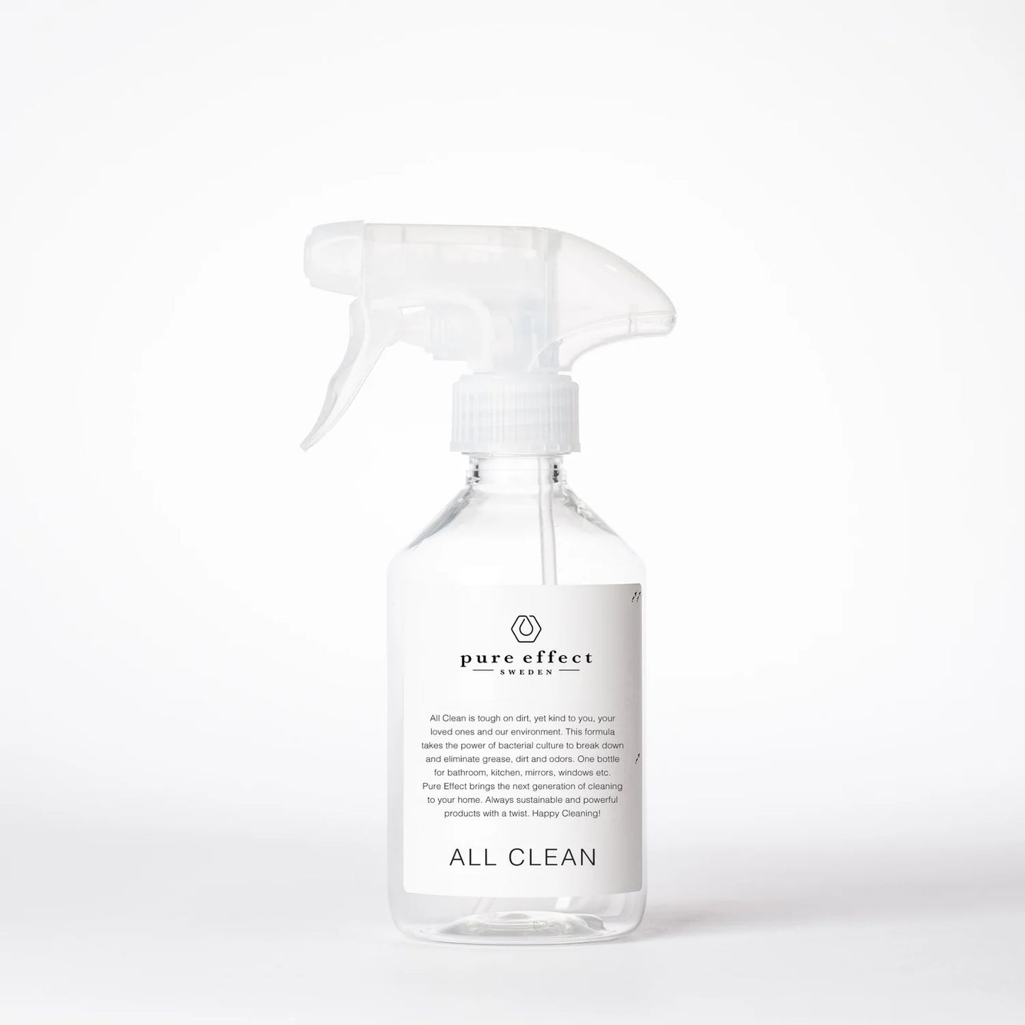 Clear spray bottle labeled 'pure effect' on a white background