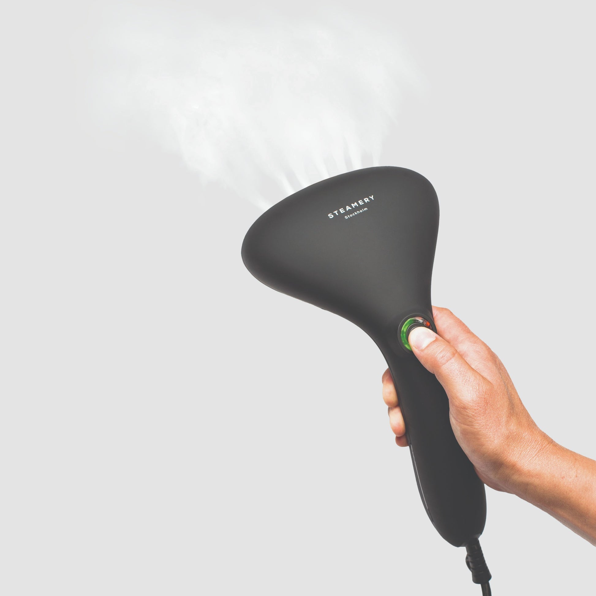The hot steam from a handheld steamer lifts the textile fibers – instead of pressing them down like the iron – and makes them swell and regain their natural shape.