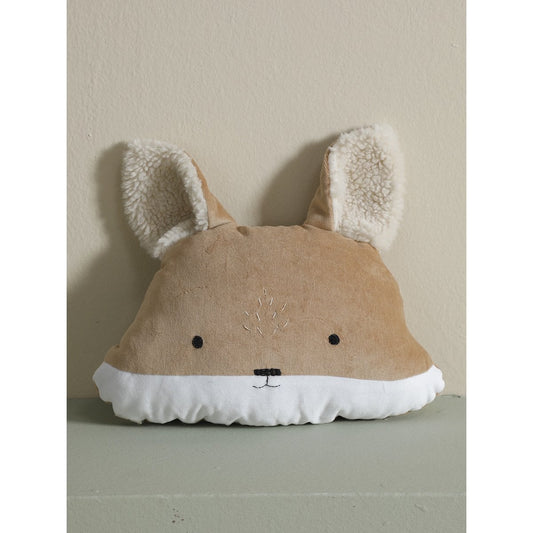 Fox-shaped pillow with white accents on a neutral background