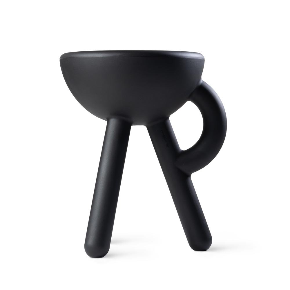 Black stool with a unique design on a white background