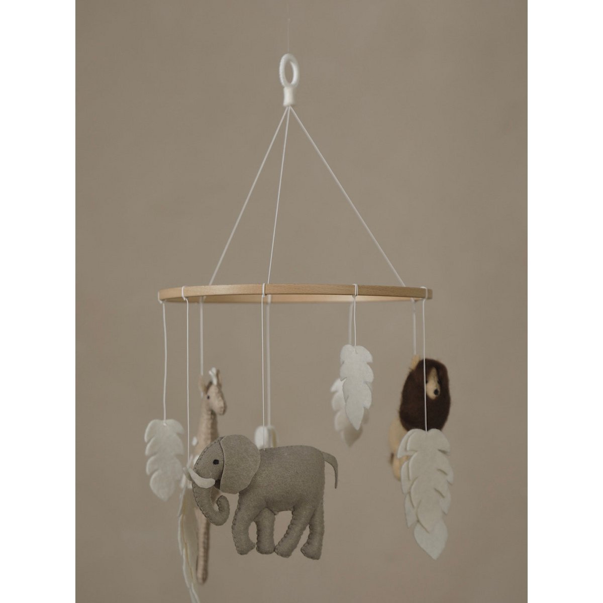 2 Stories Children's mobile with elephant, giraffe, and monkey on a beige background