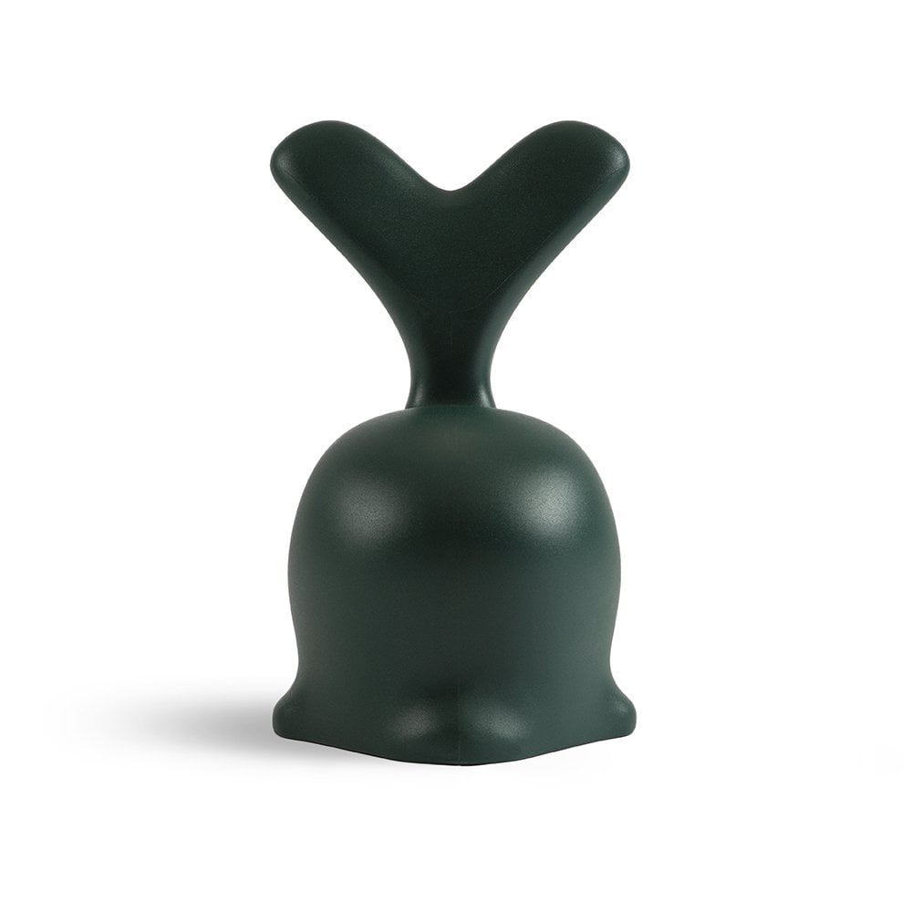 Dark green abstract sculpture on a white background