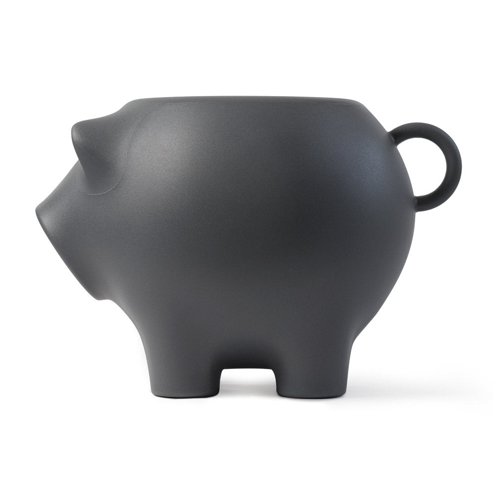 Black piggy bank on a white background