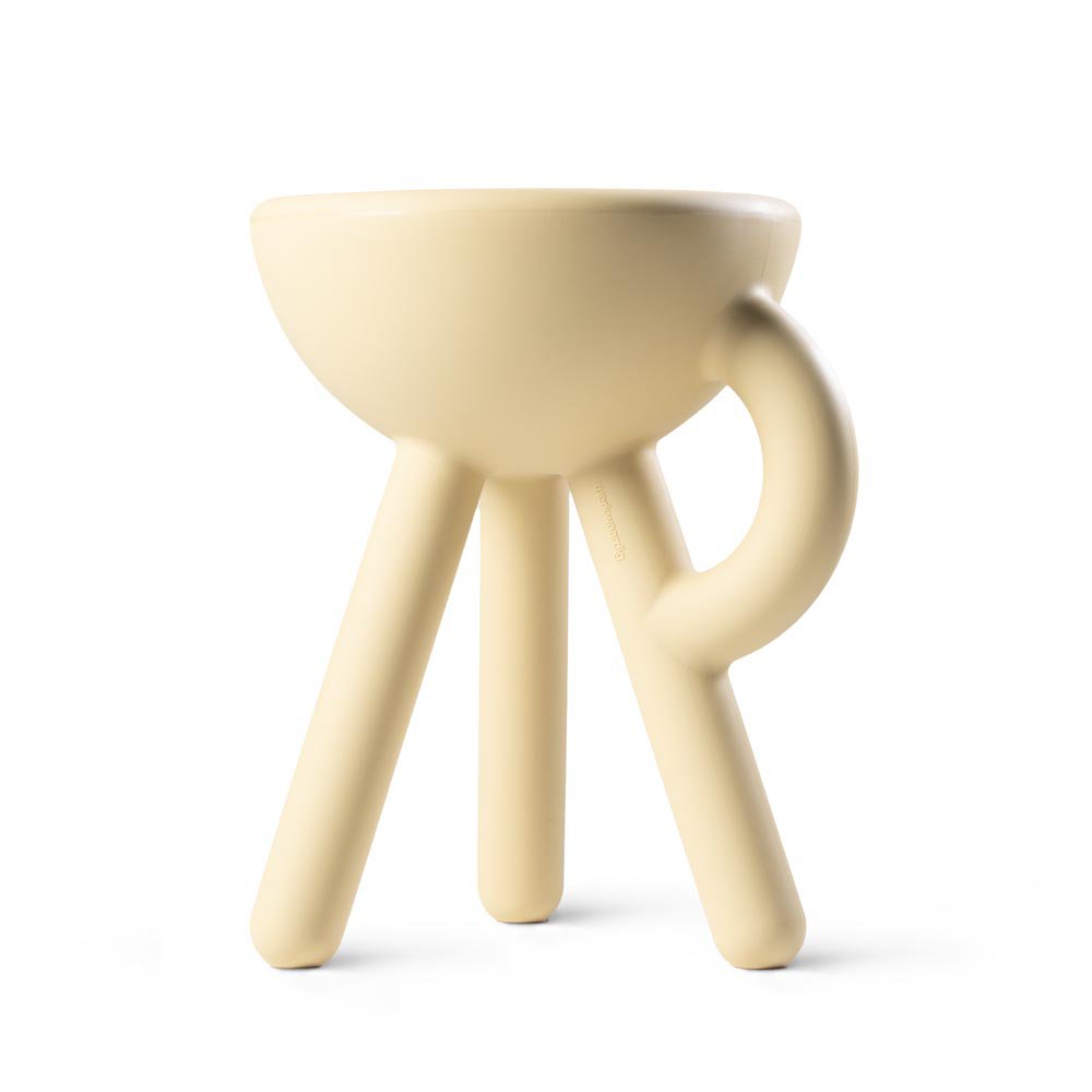 Cream-colored ceramic stool with three legs on a white background