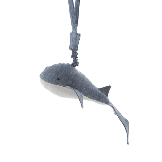 Gray whale-shaped toy with a strap on a white background
