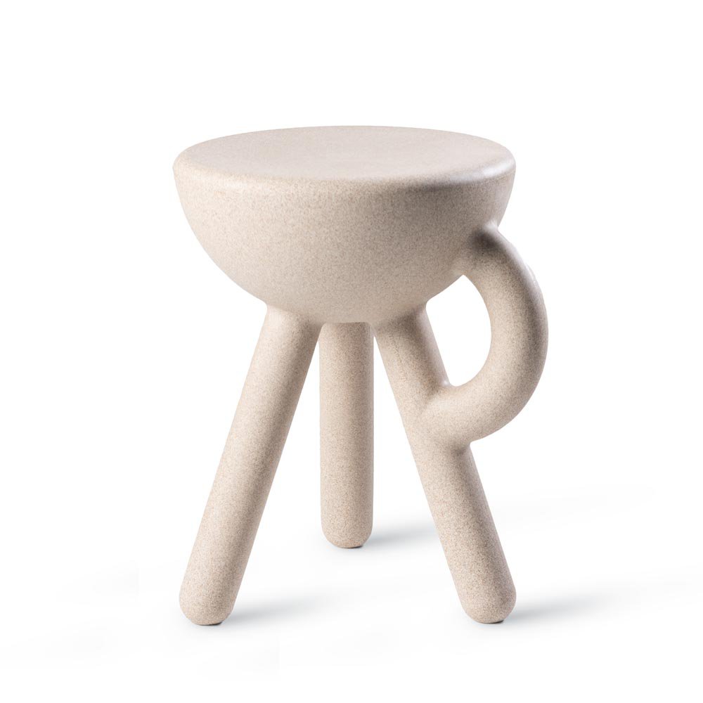 Beige ceramic stool with a unique design on a white background
