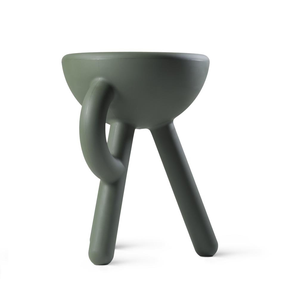 Green ceramic bowl with unique design on a white background