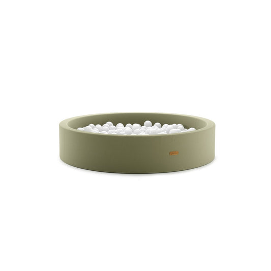 Green ball pit with white balls on a white background