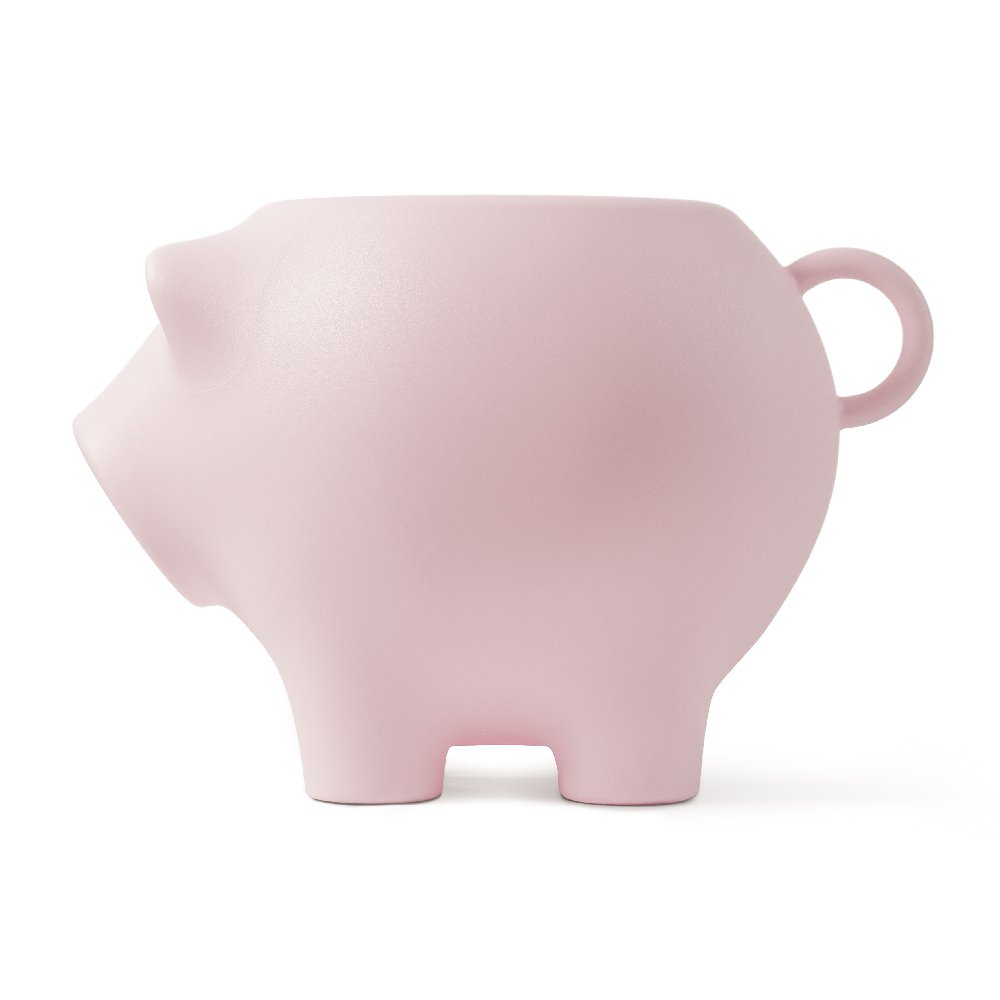 Pink piggy bank on a white background