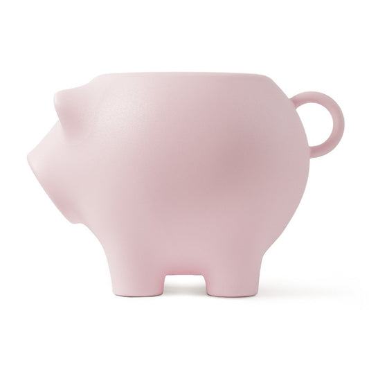 Pink piggy bank on a white background
