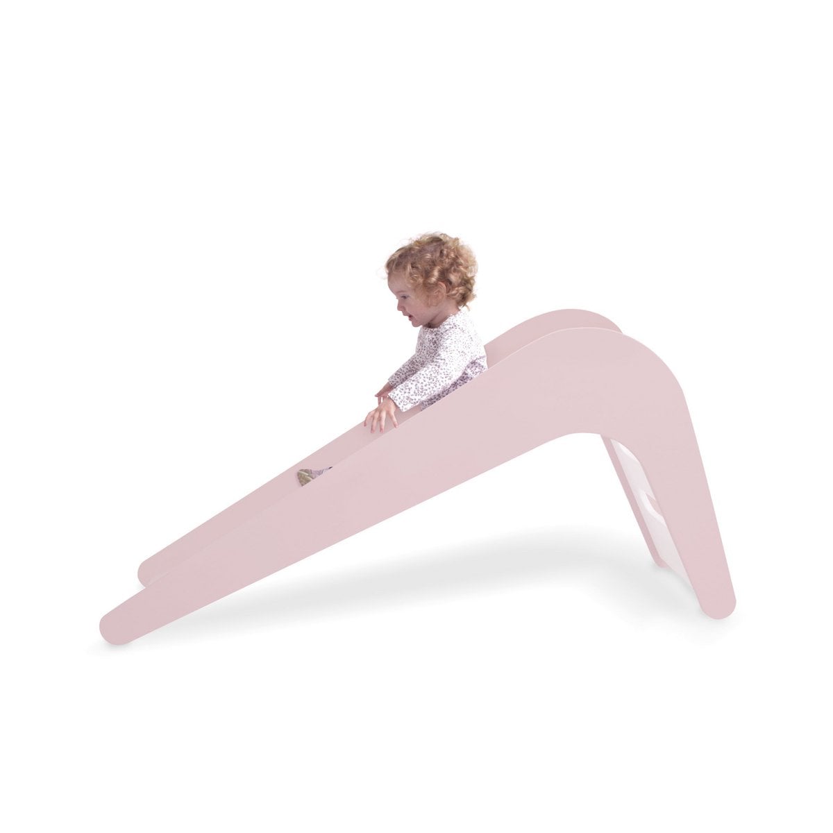 Child on a pink wavy slide against a white background