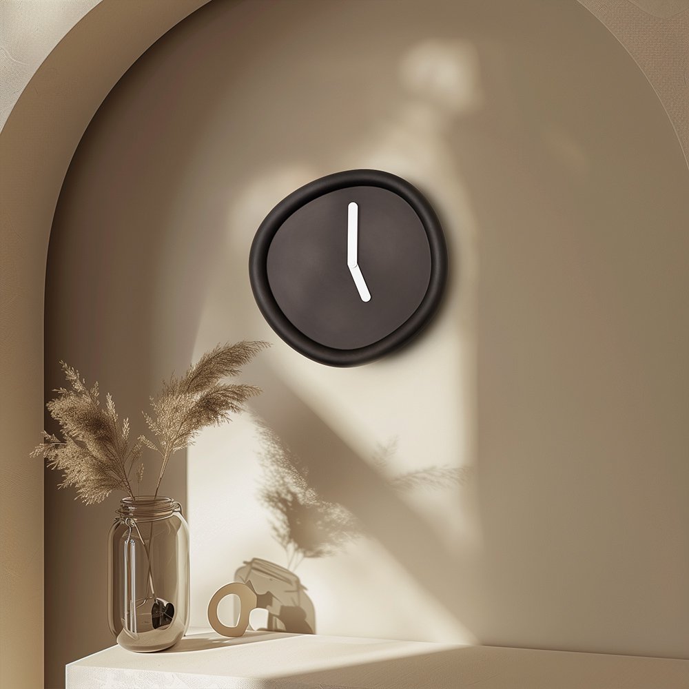 Modern wall clock on a neutral wall with decorative elements