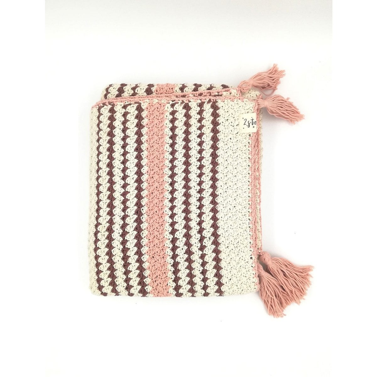 Crocheted pouch with striped pattern and tassels on a white background