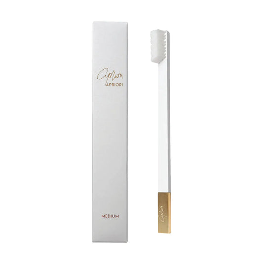 Luminescent white meets classic gold luxury in our matte white toothbrush finished with luxurious gold accents. 