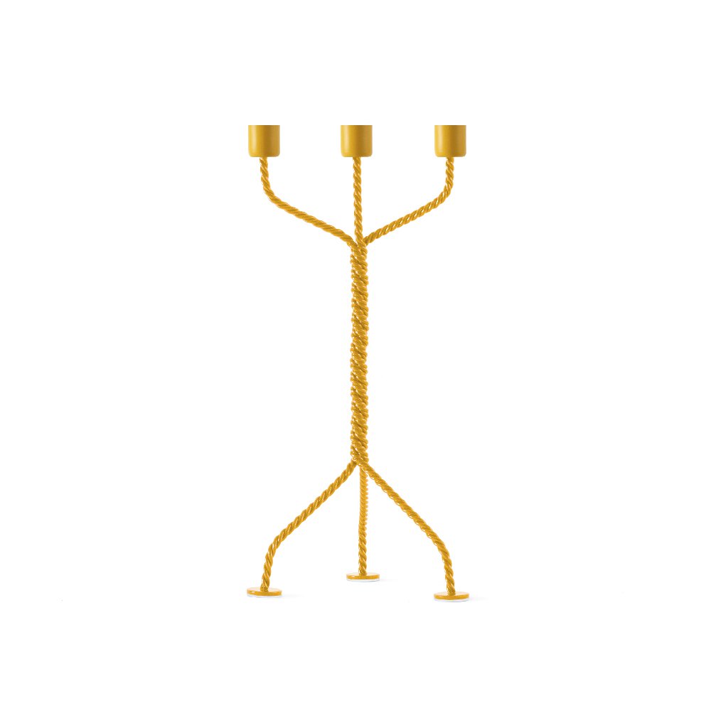 Gold candle holder with three branches on a white background