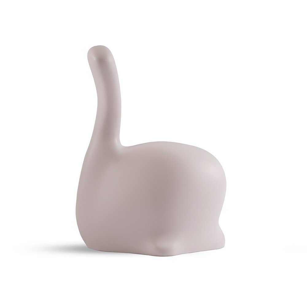Pink elephant-shaped object on a white background