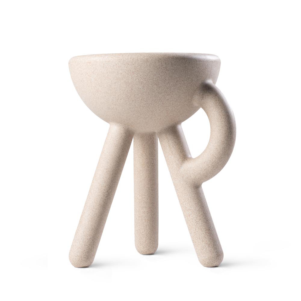 White ceramic stool with a bowl-like seat on a white background