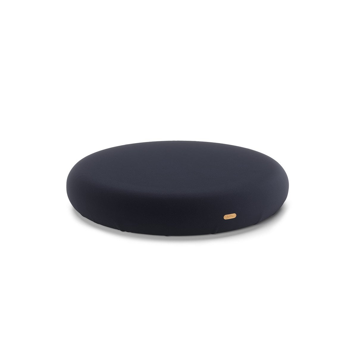 Black round cushion with a gold tag on a white background