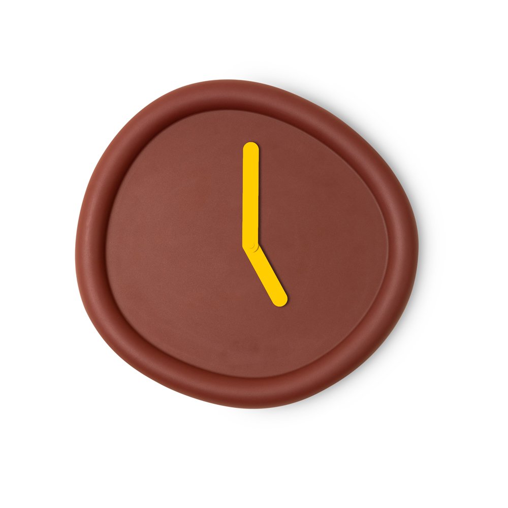 Round brown object with a yellow line on a white background