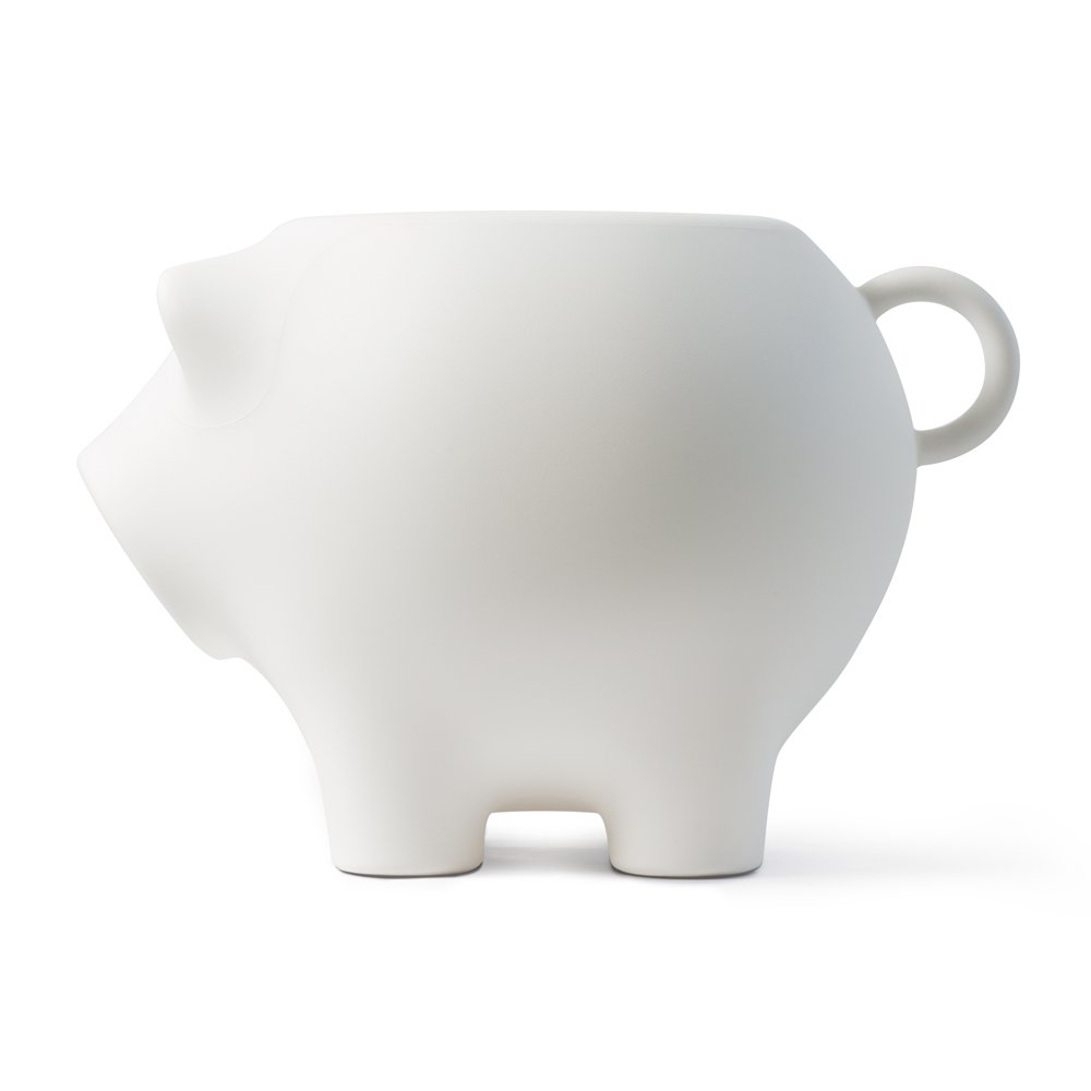 White ceramic piggy bank on a white background