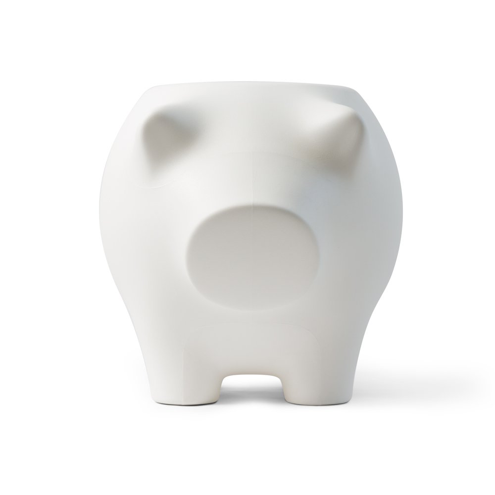 White ceramic piggy bank on a white background