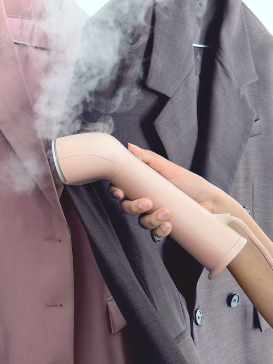 Designed with a geometric Scandinavian silhouette, it produces high-quality dry steam that de-wrinkles