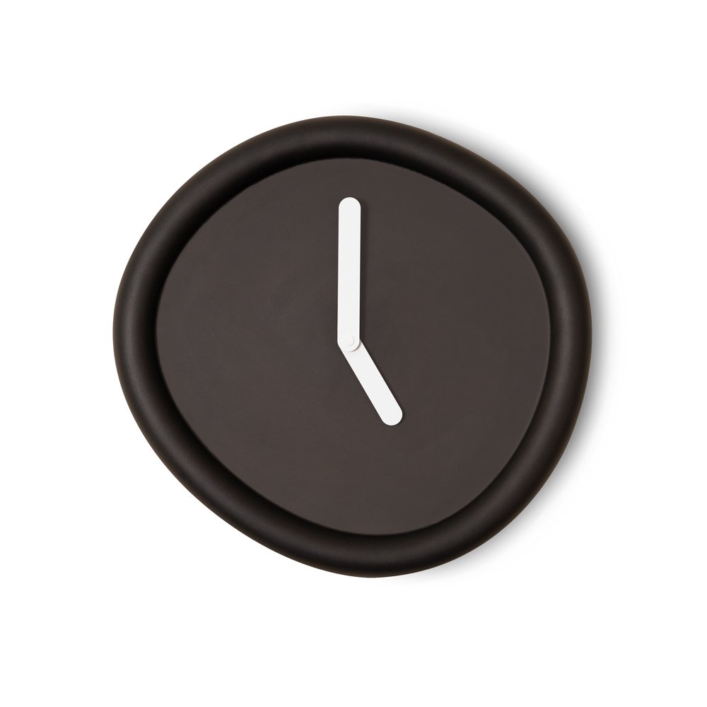 Black clock with white hour hand on a white background