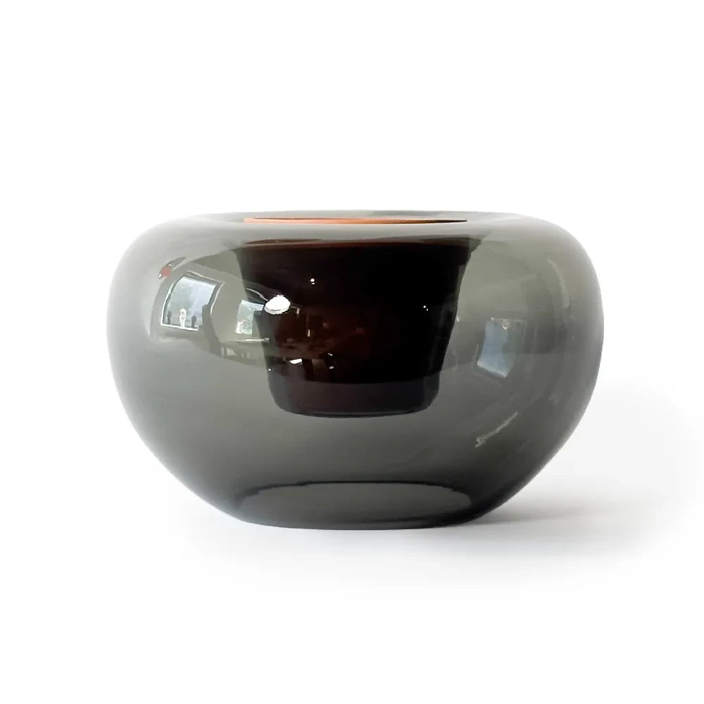 Smoky gray glass bowl on a white background