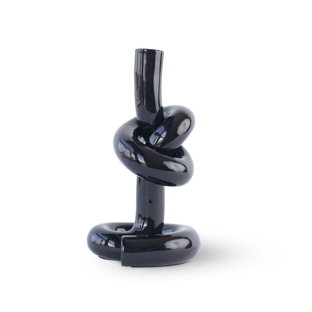 Black knot-shaped object on a white background