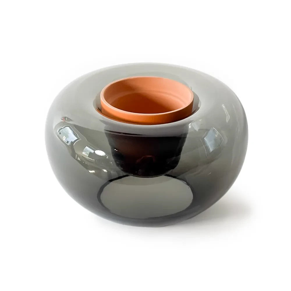 Gray and orange ceramic bowl on a white background