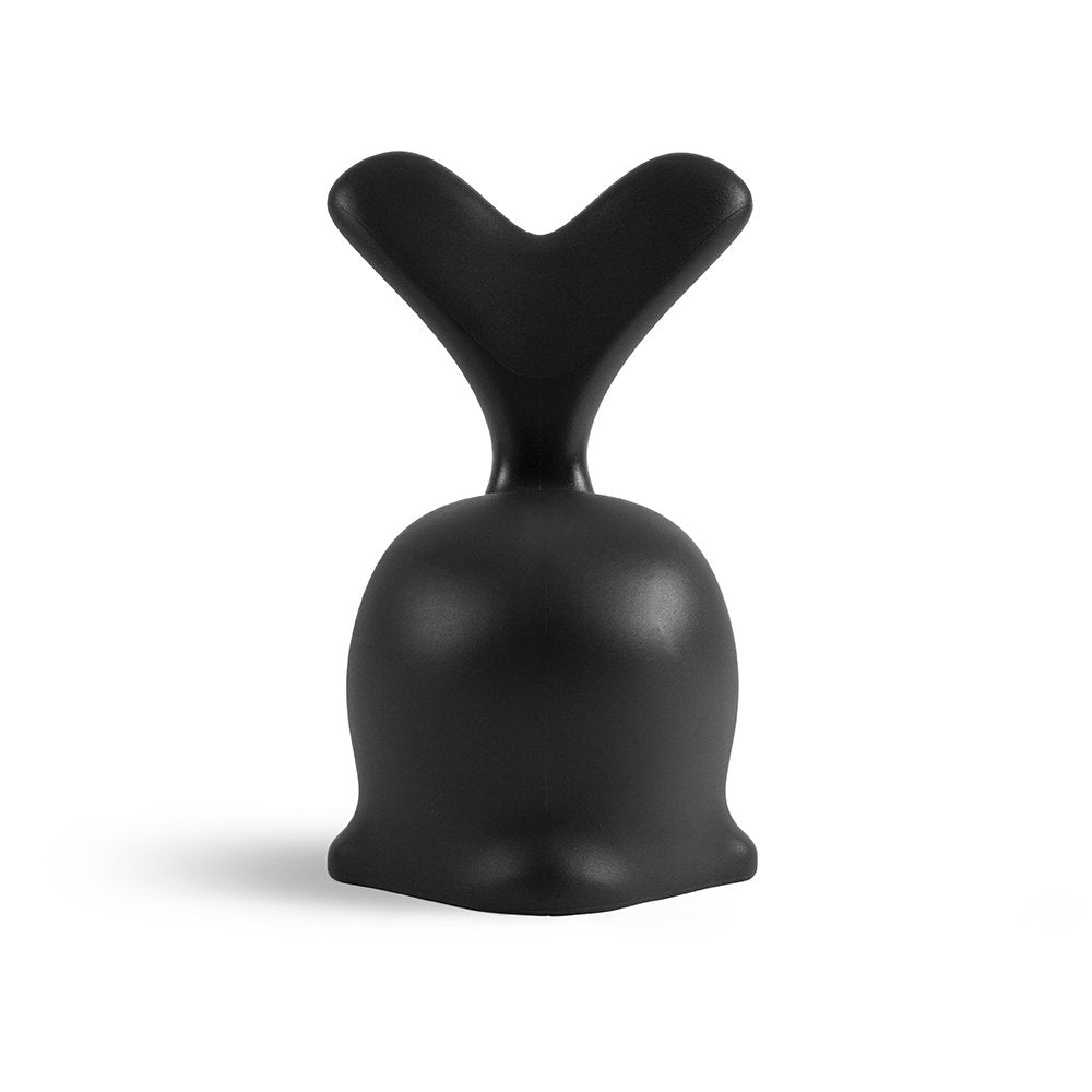 Black decorative object with a unique design on a white background