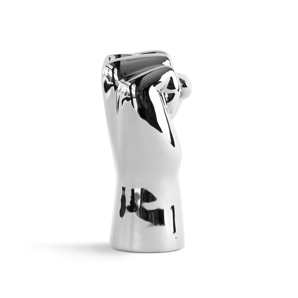 Chrome faucet handle on a white background