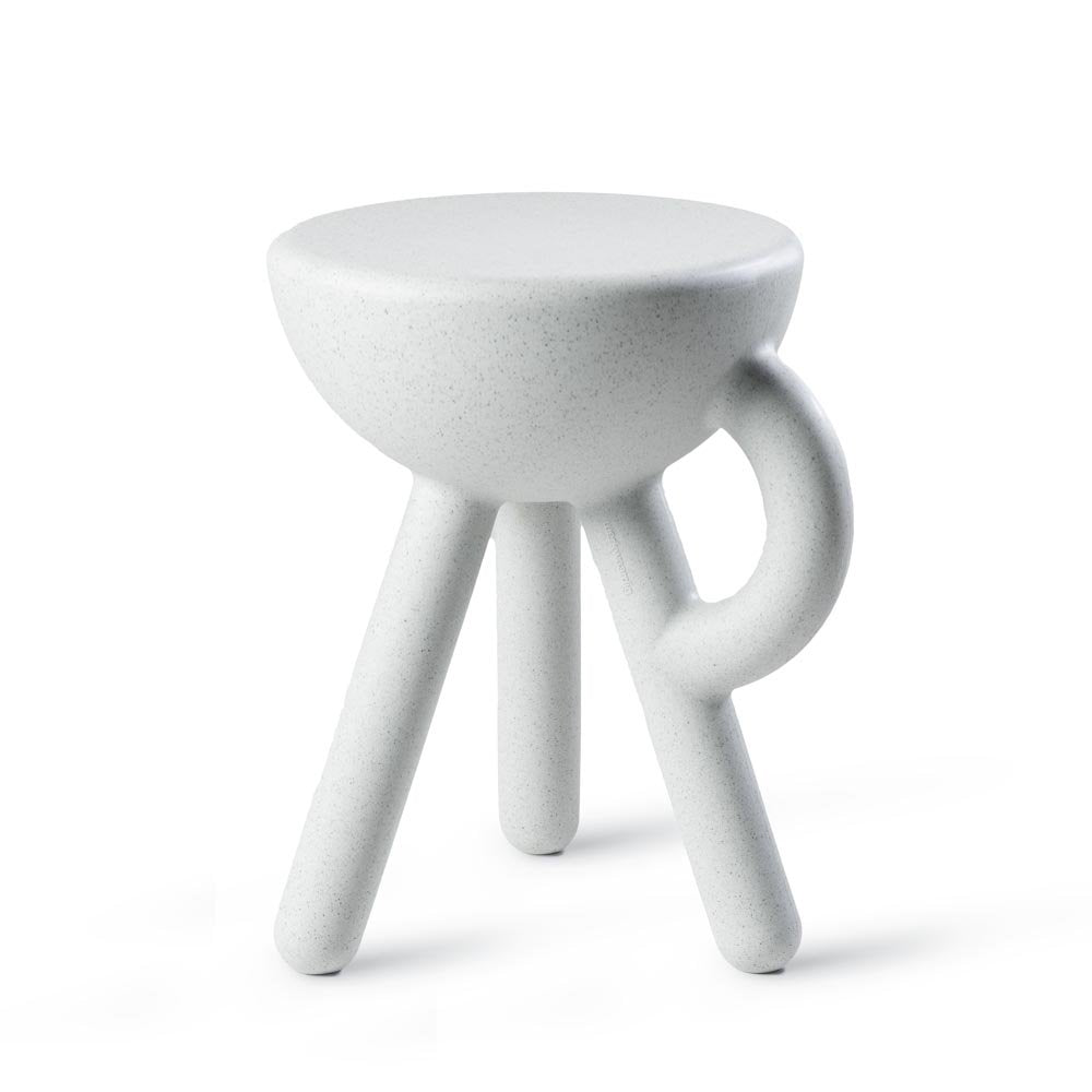 White ceramic stool with a unique design on a white background