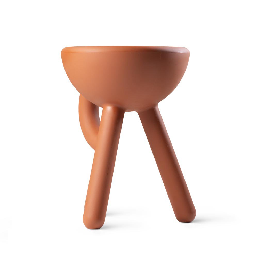 Brown ceramic stool with three legs on a white background