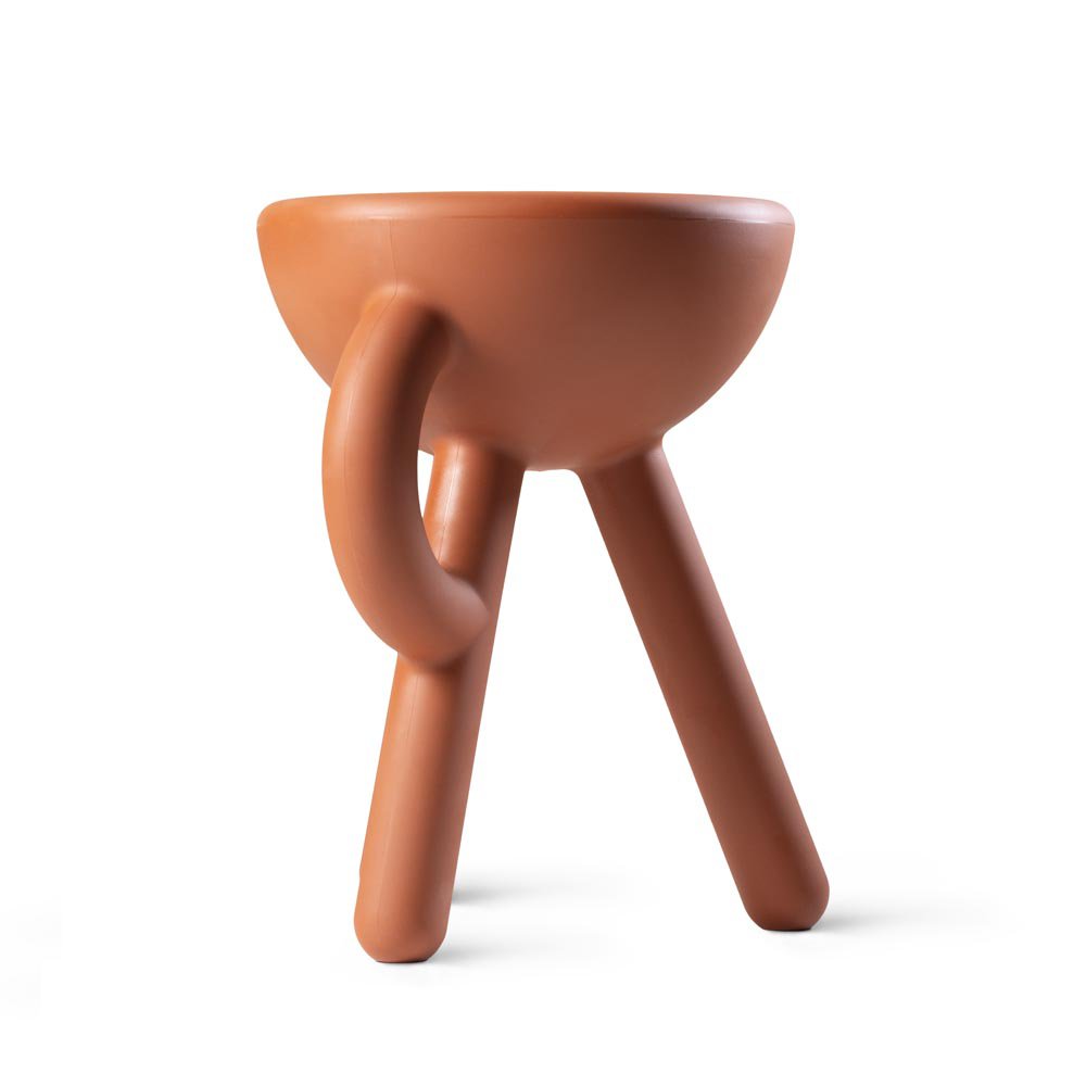 Ceramic stool with a unique design on a white background