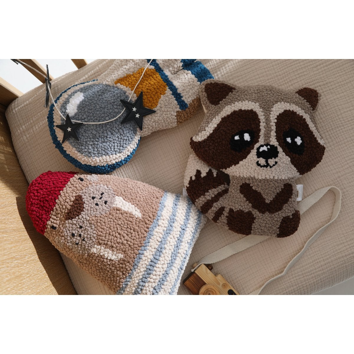 Decorative animal-themed coasters on a textured surface