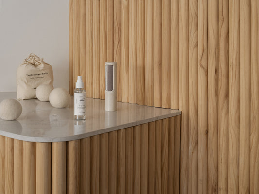 Product display on a wooden shelf with a neutral background