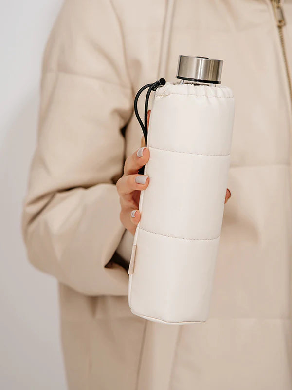Your puffer jacket goals in an equa water bottle.